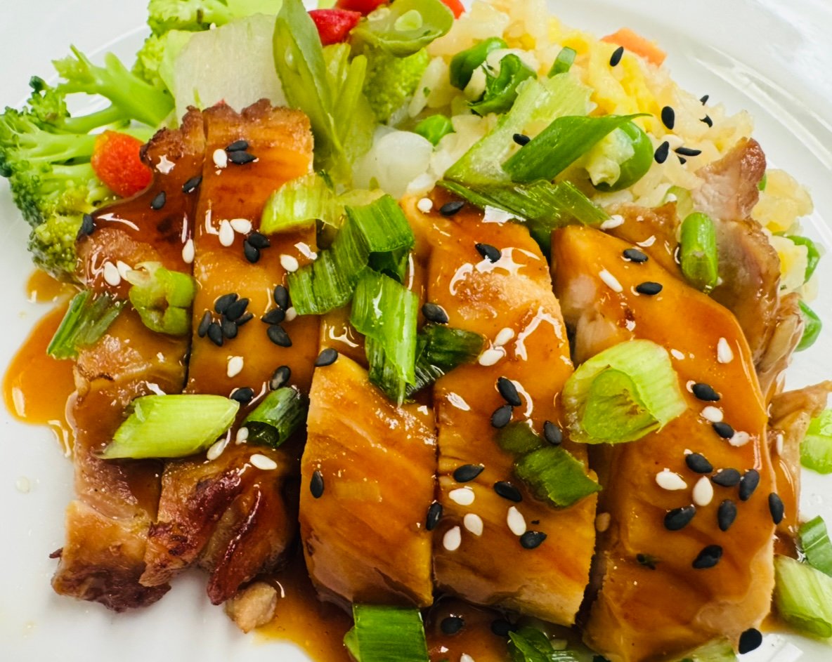 Teriyaki-style glazed chicken with rice and vegetables prepared by the culinary team at Wildomar Senior Assisted Living